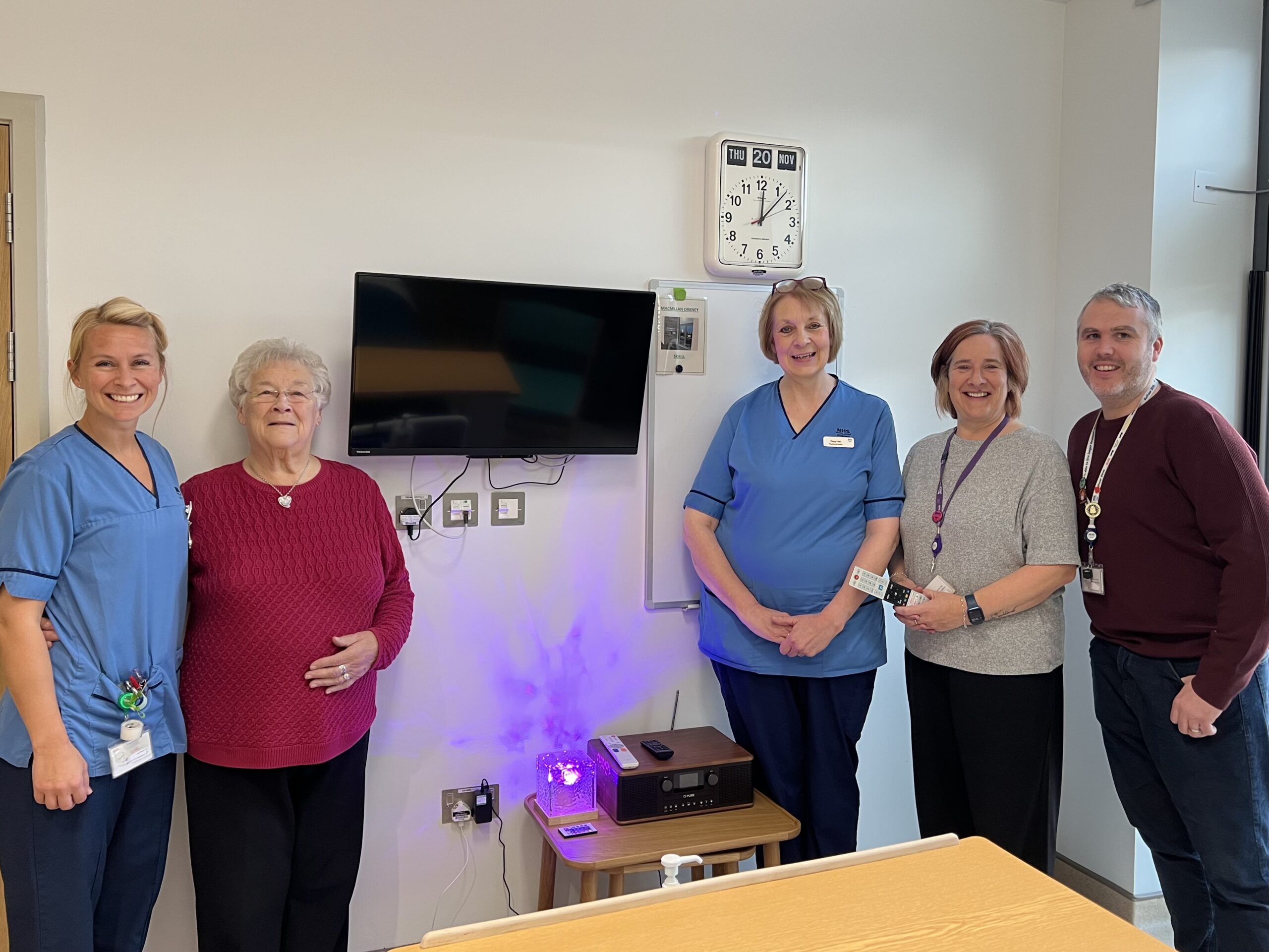 TV Donation with staff and family present